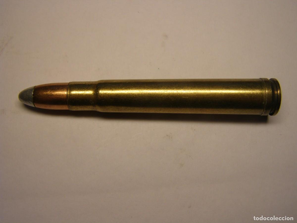 Militaria: Cartucho inerte calibre 375 H & H magnum.