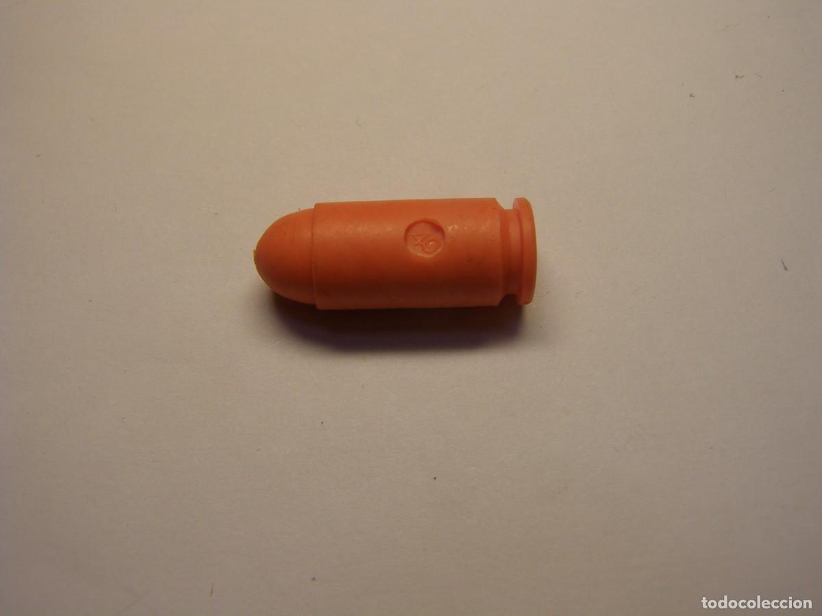 Militaria: Cartucho inerte, alivia percutores, 40 S&W.