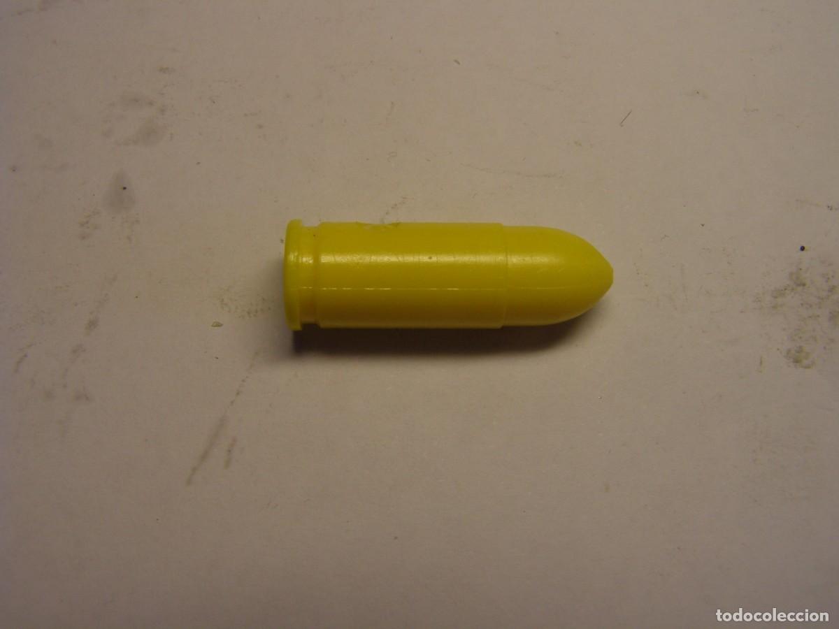 Militaria: Cartucho inerte, alivia percutores, calibre 9 LARGO.