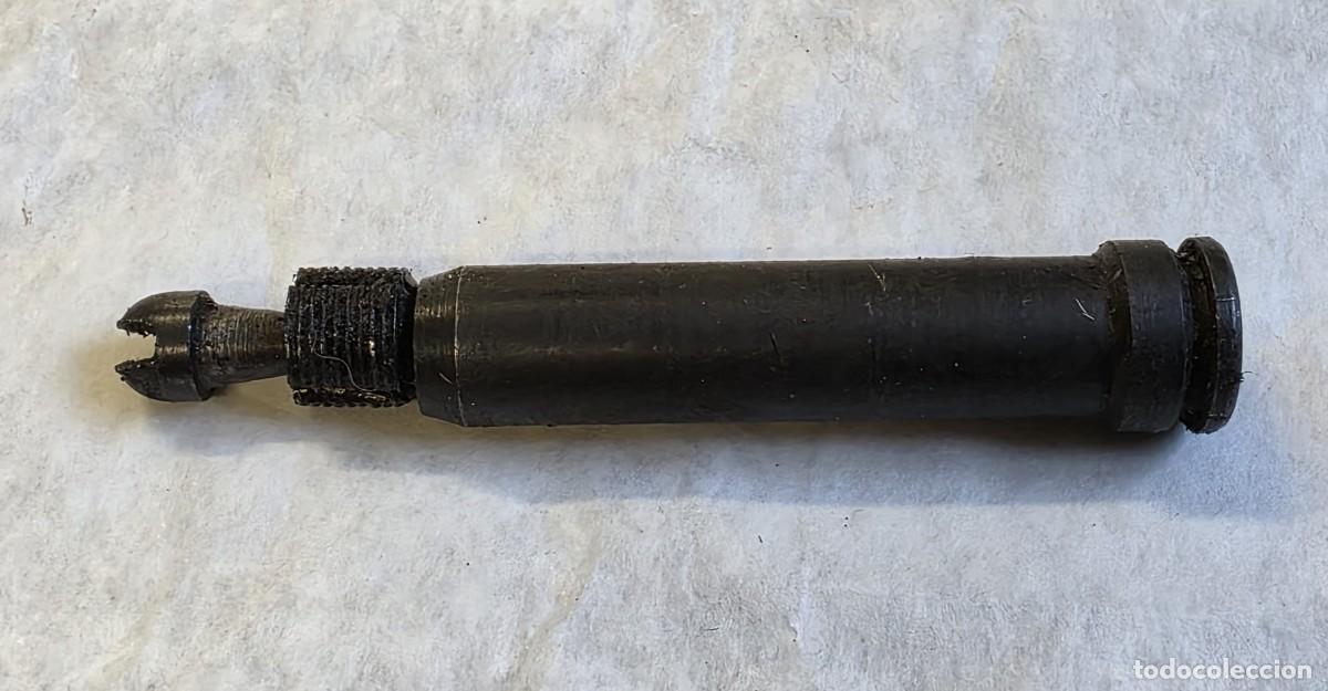 Militaria: Extractor de vainas de FAO