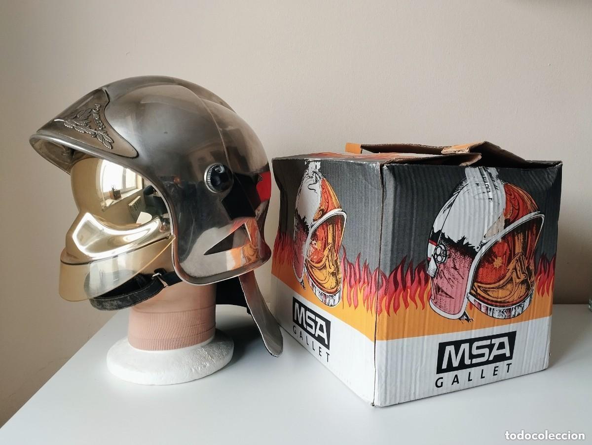 Militaria: Casco bombero Gallet con caja original y accesorios.