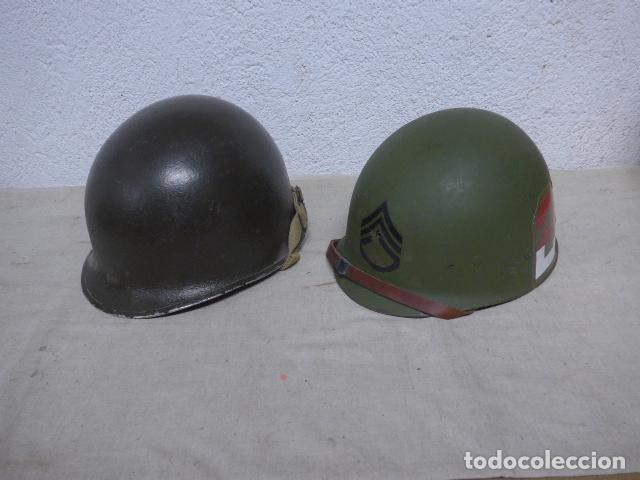 Militaria: Antiguo casco americano con corte delantero original de II Guerra Mundial, Estados Unidos.