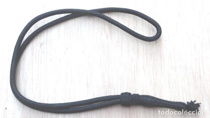 Militaria: CORDON FIADOR DE COLOR NEGRO.