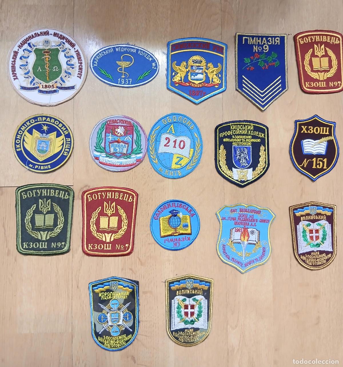 Militaria: Conjunto de 17 parches de tela con diversos dise&ntilde;os y emblemas de instituciones educativas .Ucrania