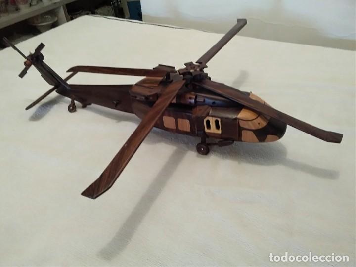 Militaria: ( UH-60 BLACK HAWK.) 42 largo x 10 de ancho. Todo madera maciza( piezas sueltas a pegar otra vez.)