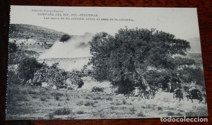Militaria: POSTAL DE LA CAMPA&Ntilde;A DEL RIF. 1921. IRGUEMAN. LAS CASAS DE LOS REBELDES ARDEN AL PASO DE LA COLUMNA.