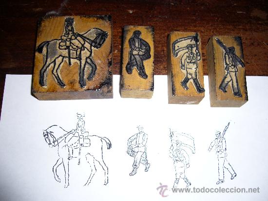 Militaria: Lote de cuatro tampones antiguos de tem&aacute;tica militar