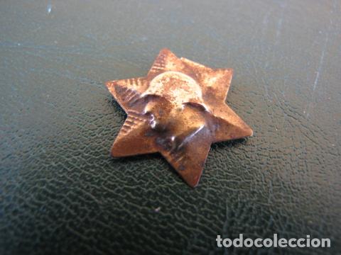 Military Antiques: Estrella de combatiente. Lat&oacute;n