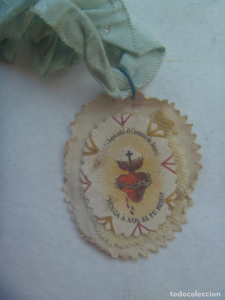 Militaria: GUERRA CIVIL : DETENTE BALA CON CORAZON DE JESUS DE MILICIANO NACIONAL.