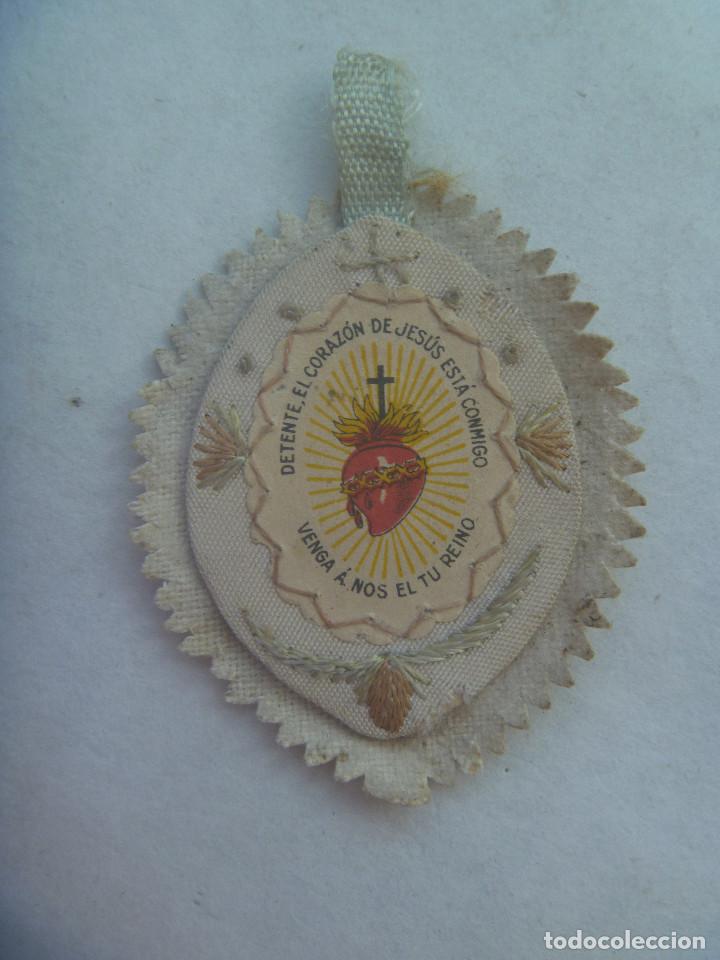Military Antiques: GUERRA CIVIL : DETENTE BALA CON CORAZON DE JESUS DE MILICIANO NACIONAL