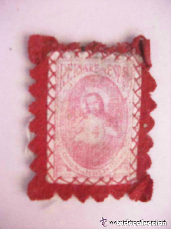 Militaria: GUERRA CIVIL : DETENTE BALA CON CORAZON DE JESUS Y SANTA BARBARA (?) DE MILICIANO NACIONAL.