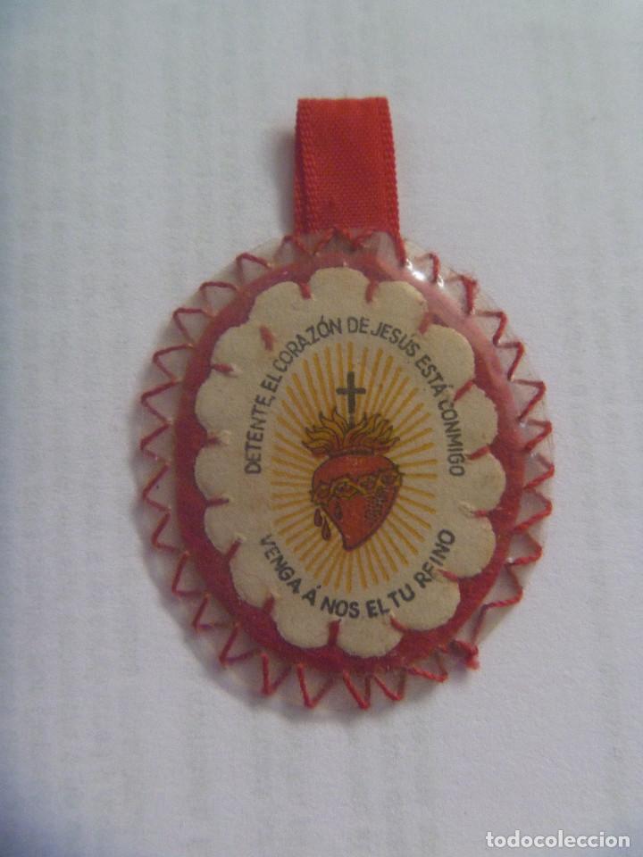 Militaria: GUERRA CIVIL : DETENTE BALA CON CORAZON DE JESUS DE MILICIANO NACIONAL