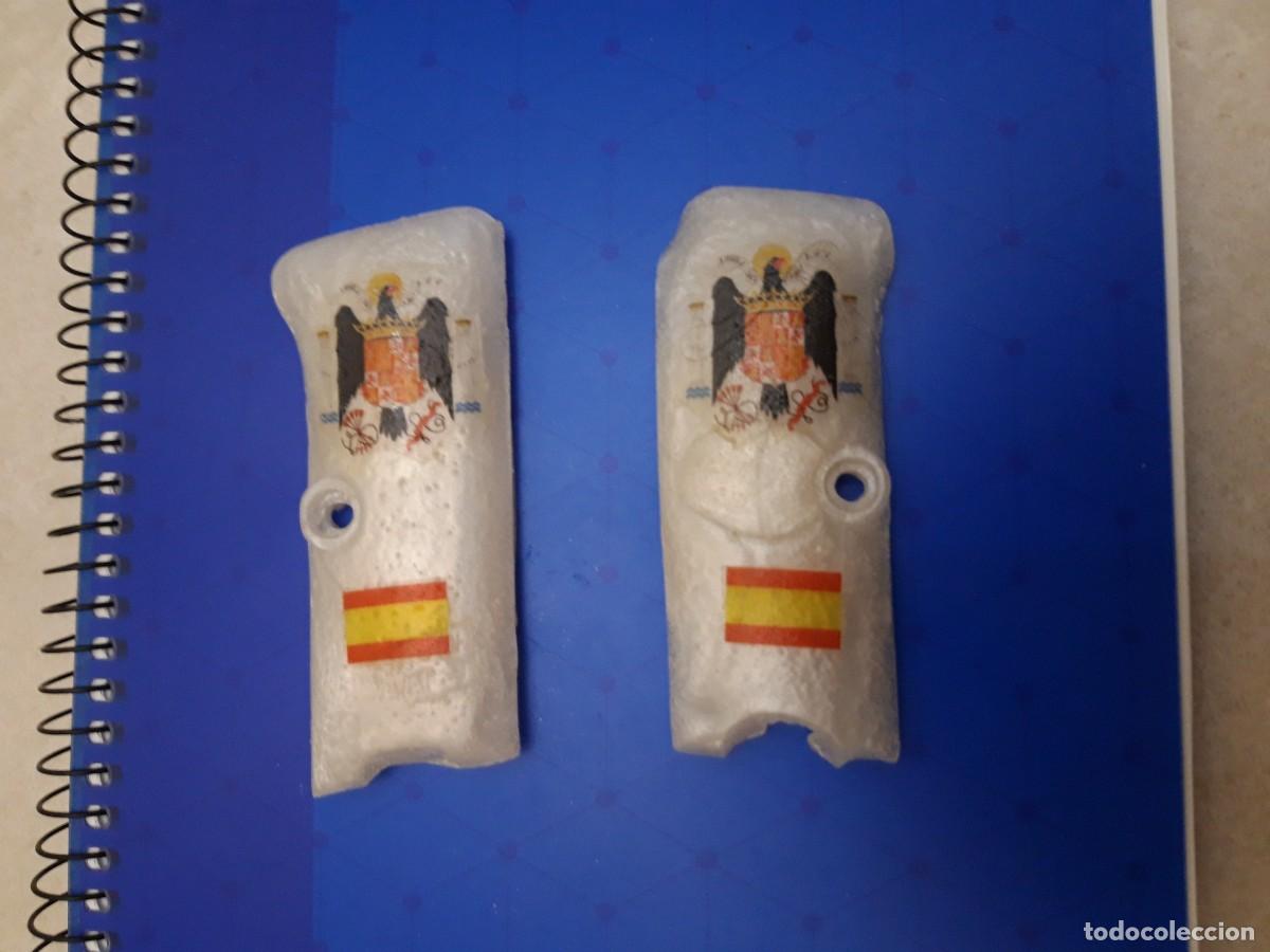 Militaria: Vendo Cachas Astra 300 con el &Aacute;guila de San Juan y la Bandera de Espa&ntilde;a (REPRODUCCI&Ouml;N)