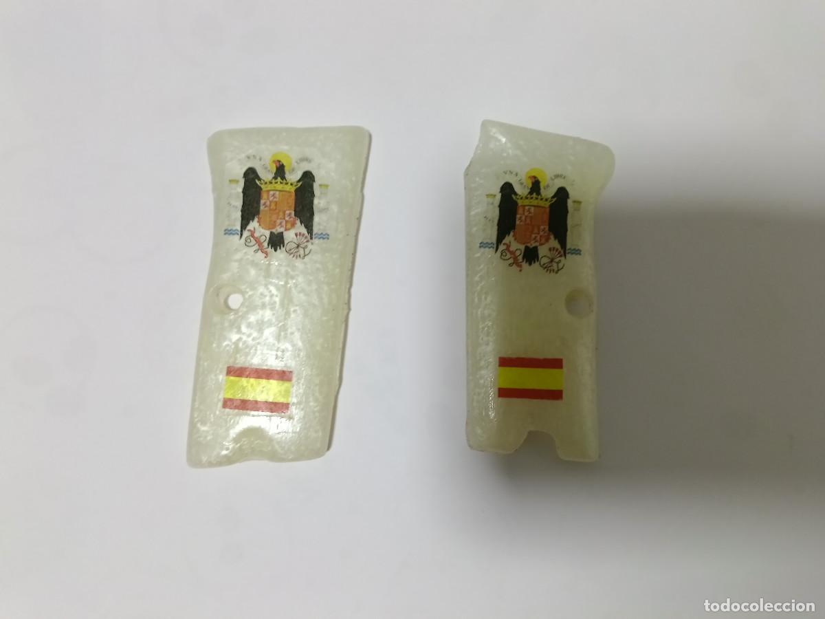Militaria: Vendo Cachas Astra 300 con el &Aacute;guila de San Juan y la Bandera de Espa&ntilde;a (REPRODUCCI&Ouml;N)