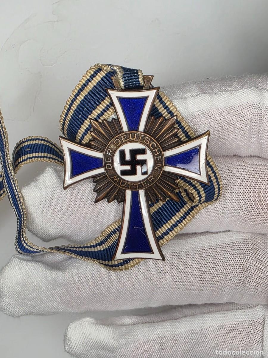 Militaria: Cruz de la Madre Alemana en bronce 1938 con cinta &ndash; Mutterkreuz original WWII