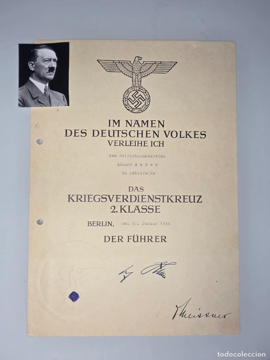 Militaria: Documento alem&aacute;n WWII 1944 Cruz M&eacute;rito Guerra con firma facs&iacute;mil de Adolf Hitler original