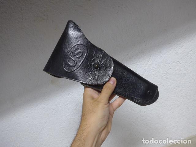 Military Antiques: Antigua funda americana de pistola Colt en negro de US, con marcajes, original, II Guerra Mundial