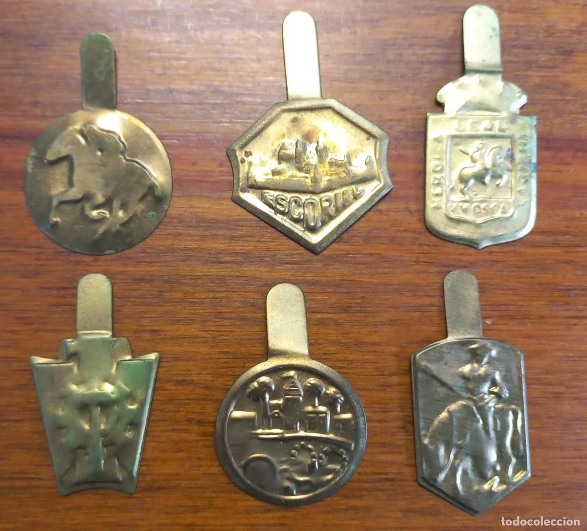 Militaria: 6 Emblemas auxilio social, metalicos.
