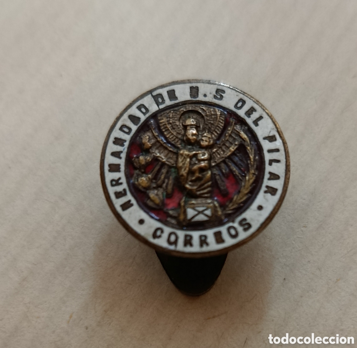 Militaria: insignia correos. Hermandad de Nuestra Se&ntilde;ora del Pilar. esmalte al fuego