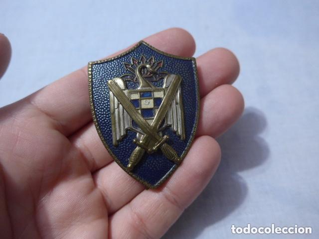 Militaria: Antigua placa emblema del SEU, Milicias Universitarias, Falange. Original.