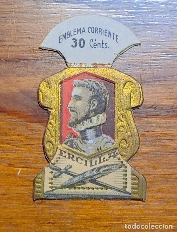 Militaria: Emblema auxilio social, corriente 30 cents, serie E, N&ordm; 2, ALONSO ERCILLA.