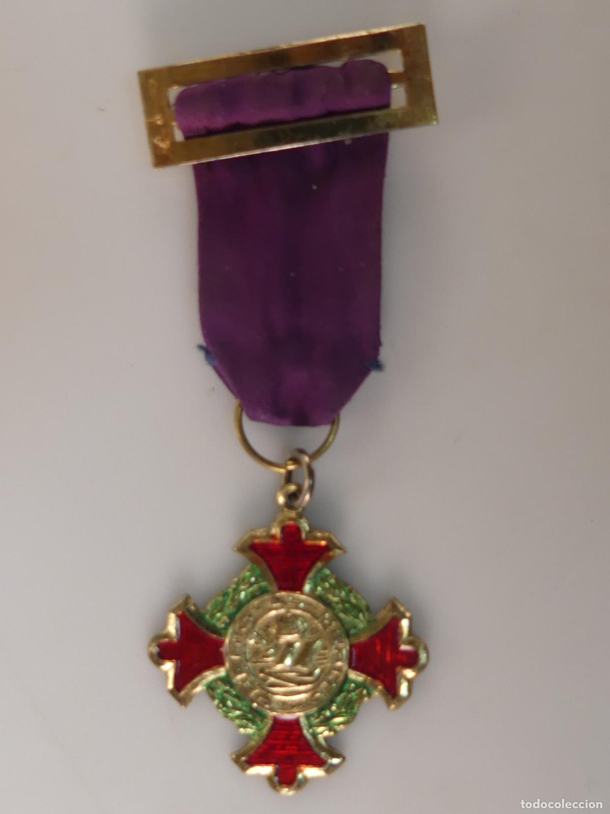 Militaria: MEDALLA INSIGNIA PREMIO AL MERITO