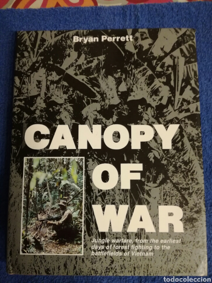 Militaria: Canopy of War.Libro sobre la guerra en la jungla durante la Segunda Guerra Mundial y Vietnam.