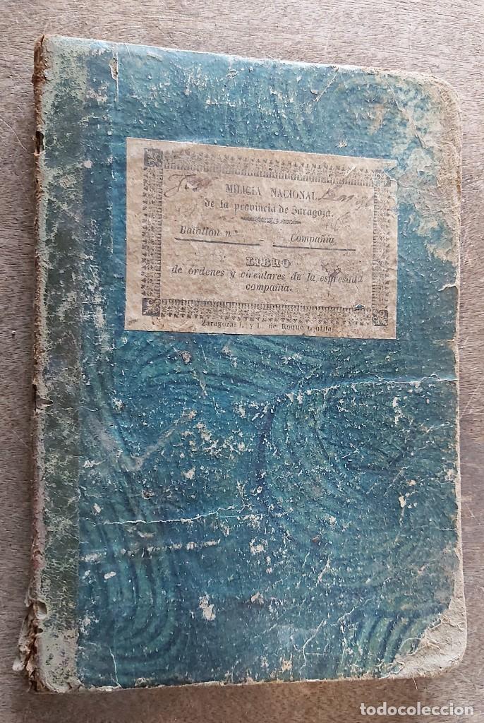 Militaria: Cartilla de la Milicia Nacional de la prov&iacute;ncia de Zaragoza, con anotaciones personales de un cura