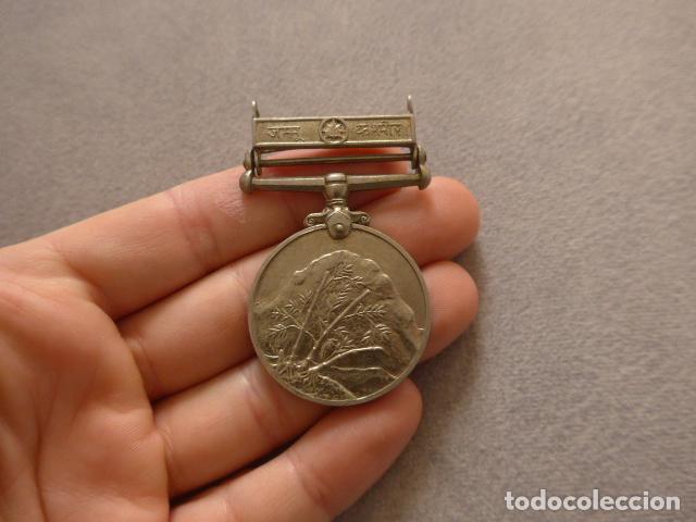 Militaria: Antigua medalla inglesa de la India, original. Otorgada