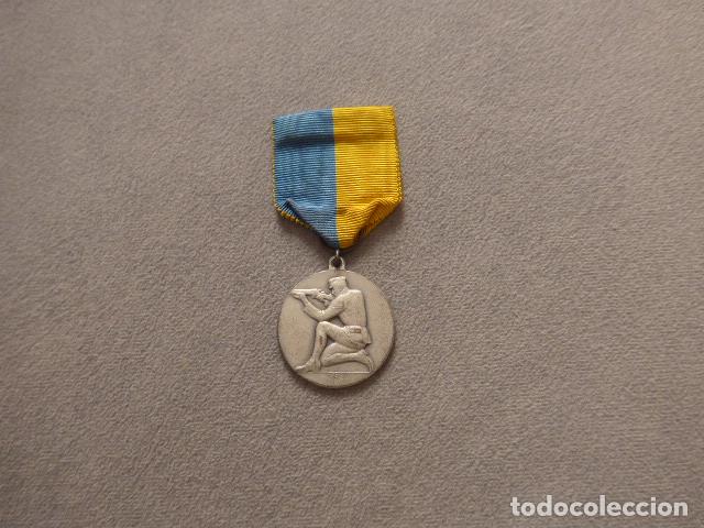 Militaria: Antigua medalla sueca de tirador fechada en 1941, original. II Guerra Mundial. Suecia.