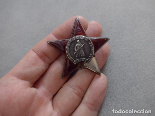 Militaria: Antigua medalla rusa orden de la estrella roja de URSS comunista de 1944 numerada 1093959. II Guerra