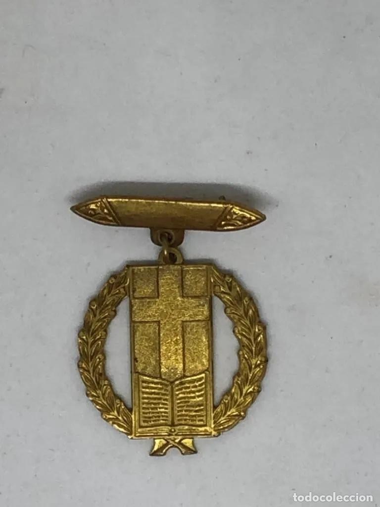 Militaria: Medalla dorada cruz y biblia