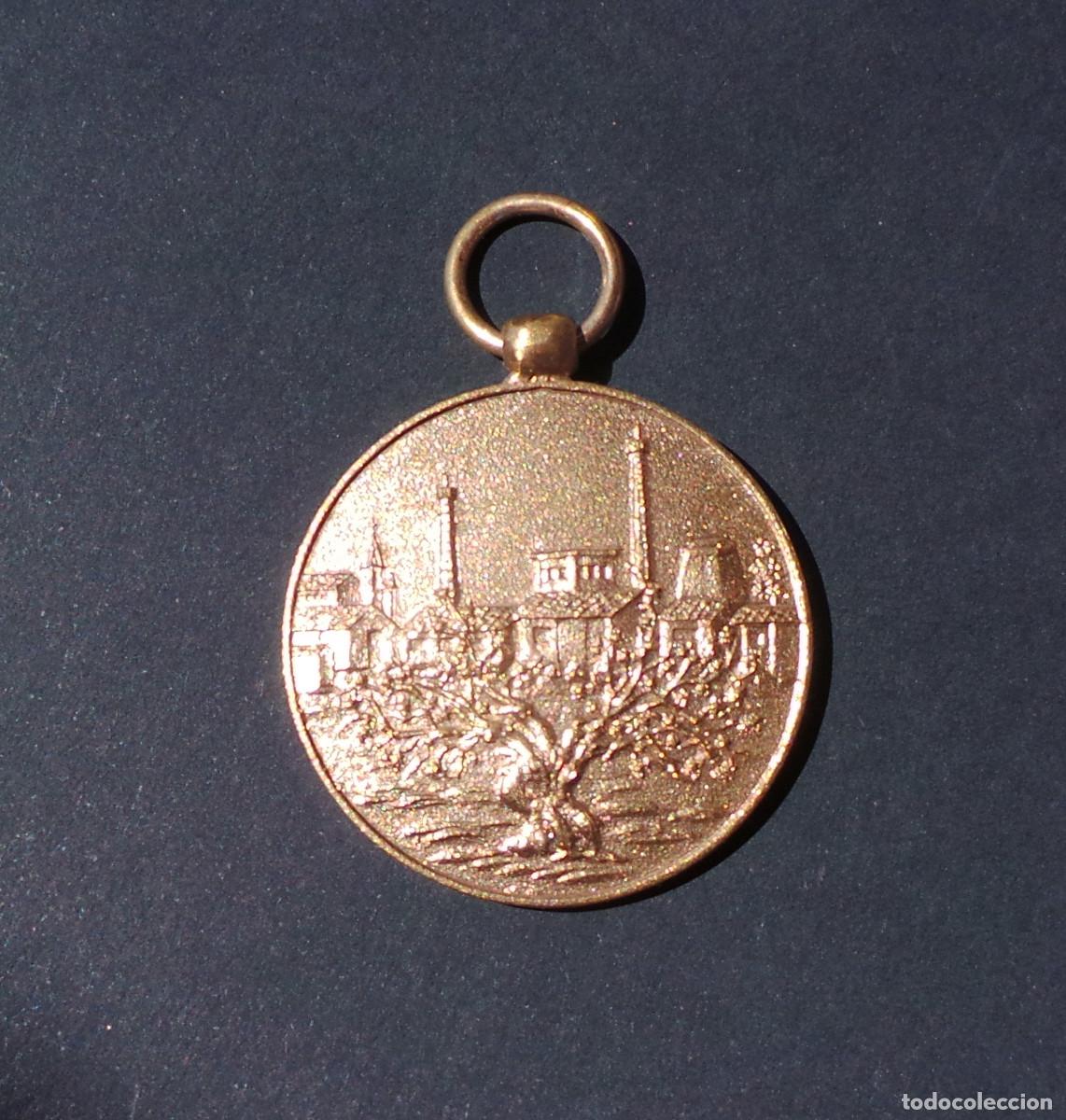 Militaria: MEDALLA LUIS MEDINA GARVEY - PREMIO A LA CONSTANCIA - PILAS. SEVILLA.