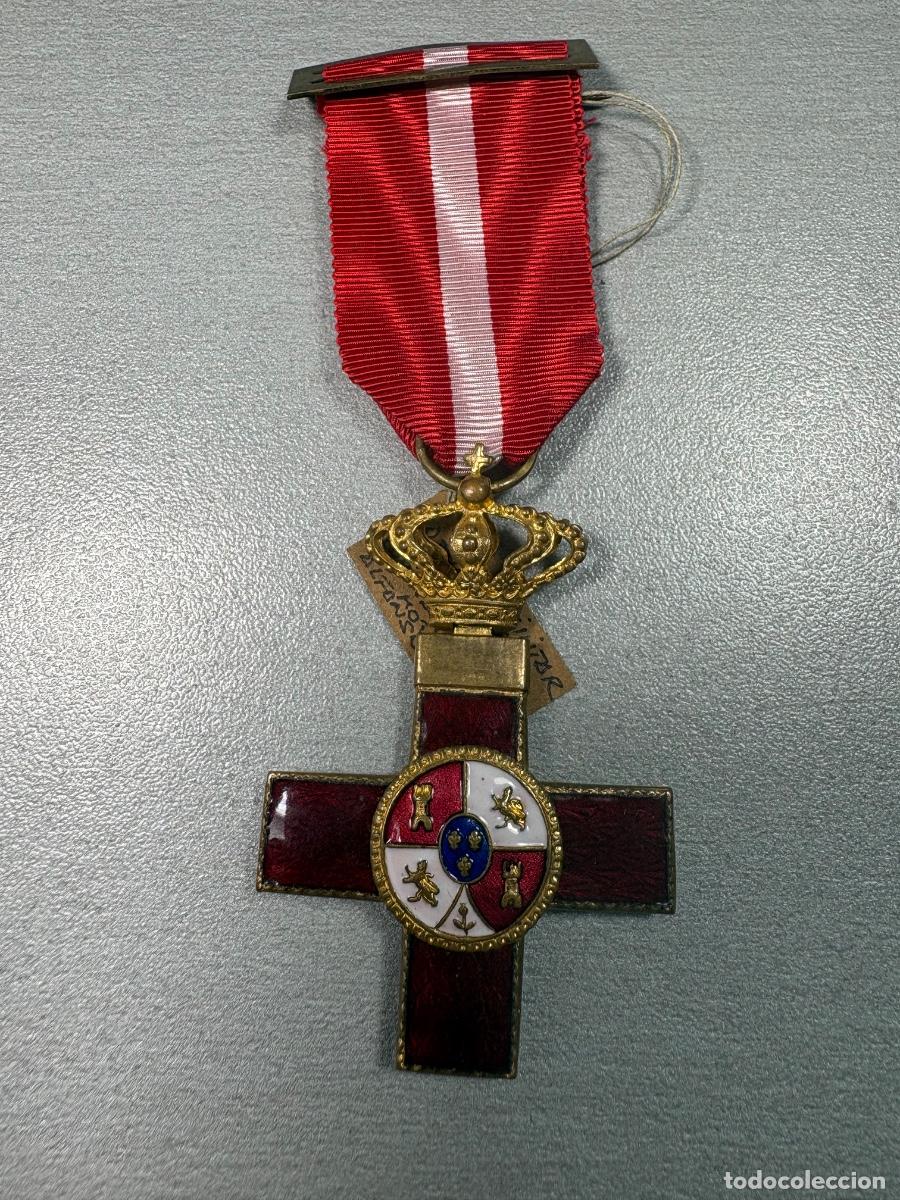Militaria: Cruz al m&eacute;rito militar distintivo en rojo.alfonso XIII