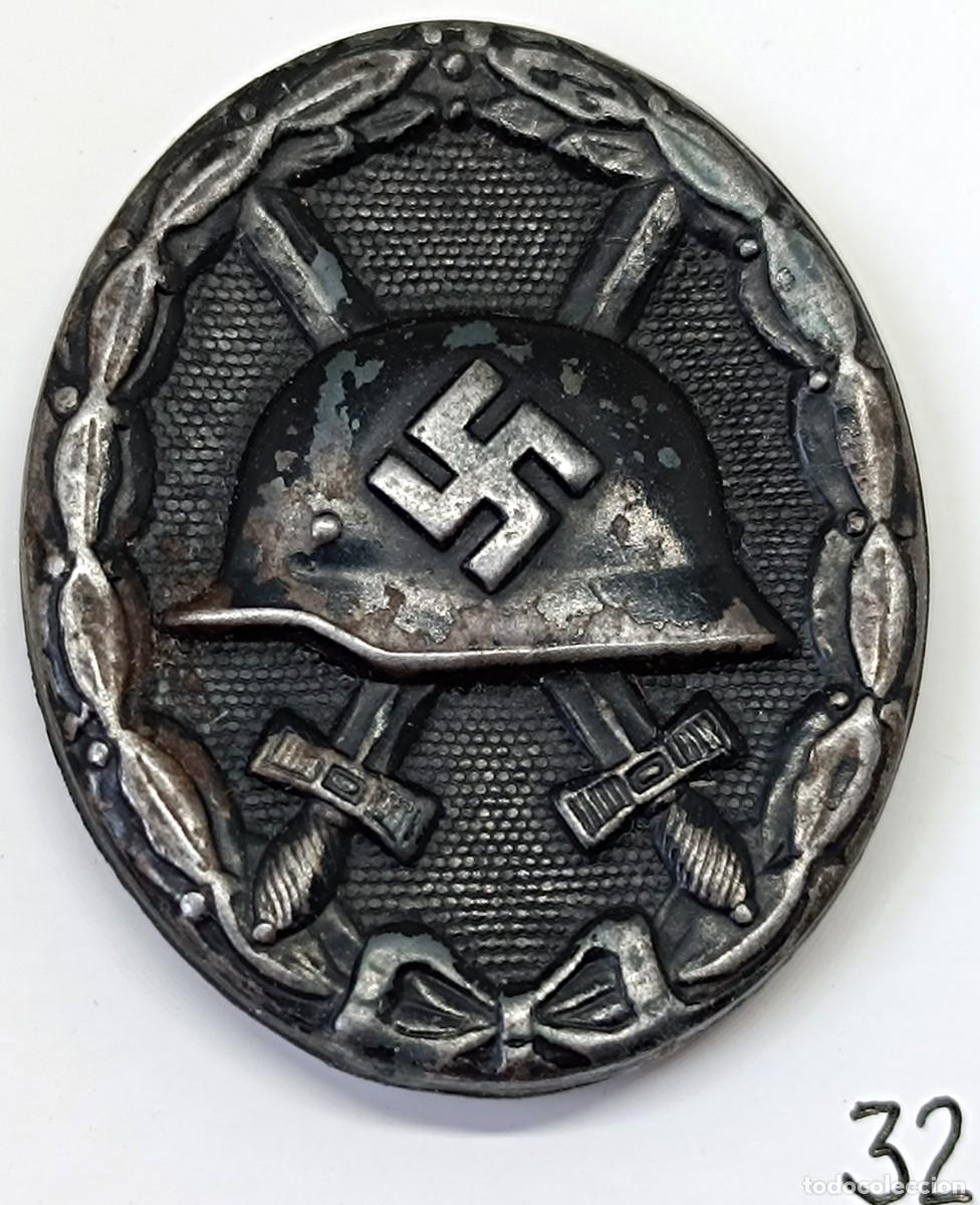 Militaria: Medalla de herido 1939 clase negra. Marcada &rdquo;32&rdquo;.