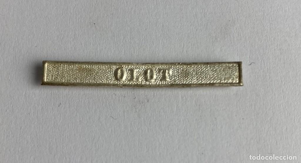 Militaria: Pasador OLOT de la Medalla de Alfonso XII de 1875 3&ordf; Guerra Carlista