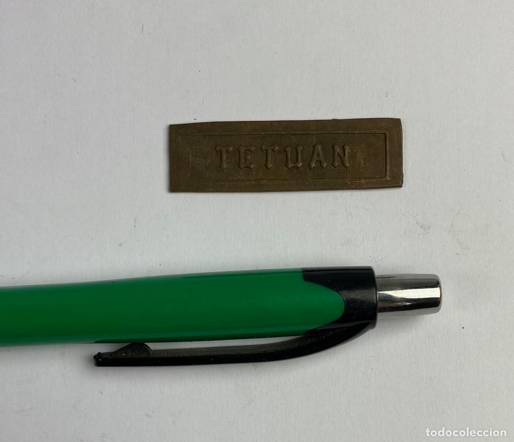 Militaria: Pasador para cinta de condecoraci&oacute;n en bronce TETUAN sin recortar Castells 63