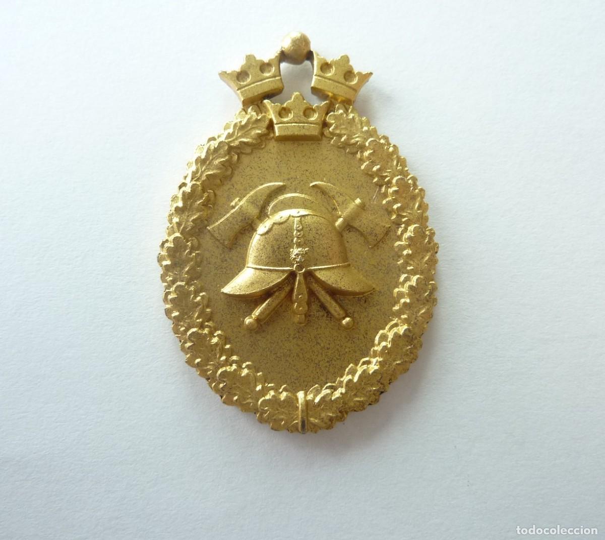 Militaria: Suecia: medalla asociaci&oacute;n nacional sueca de cuerpos de bomberos. Fabricada en plata dorada.