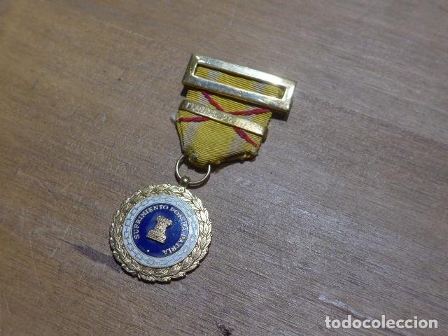 Militaria: Antigua medalla Sufrimiento por la patria con pasador original de TERUEL 20-1-1938, Guerra civil.