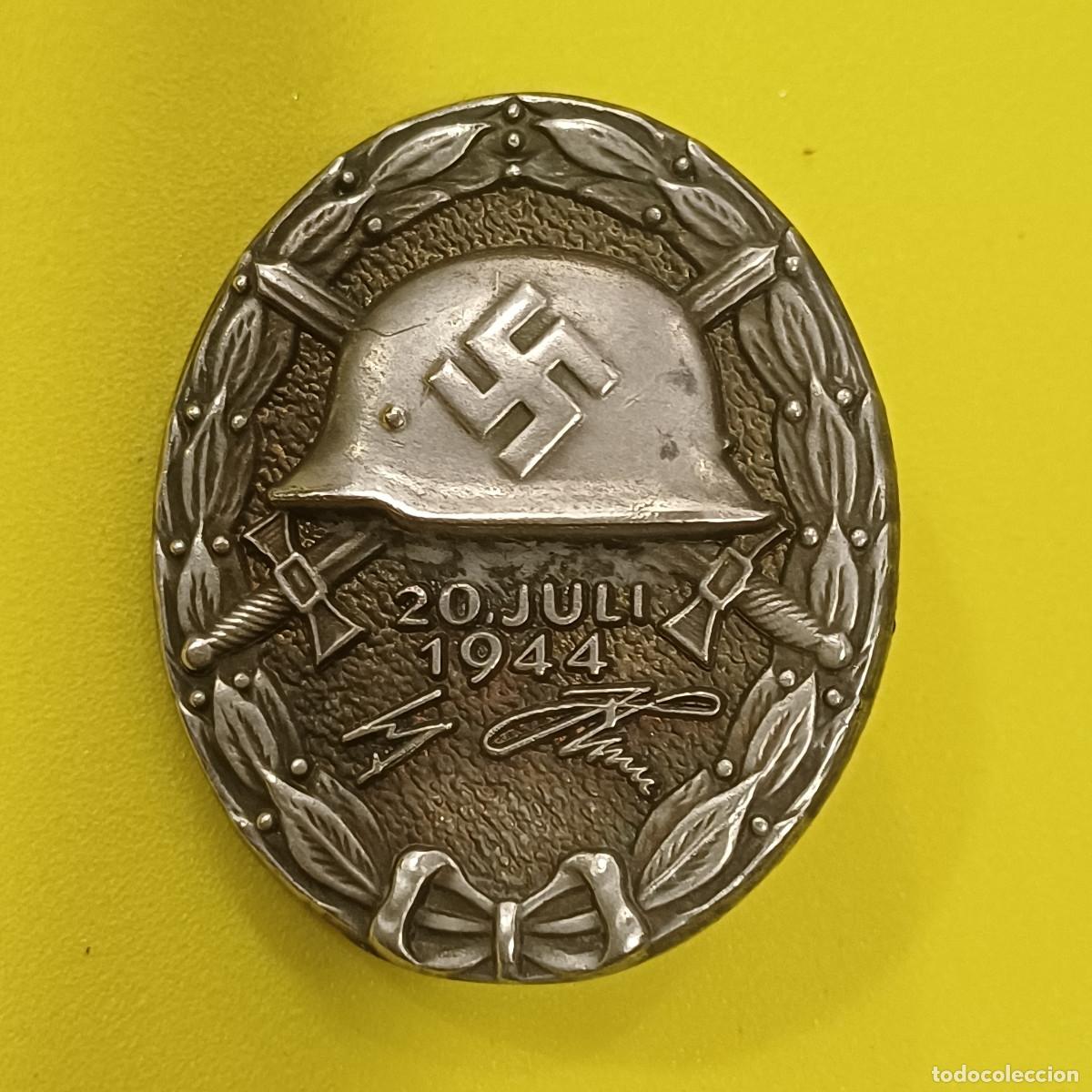 Militaria: MEDALLA DE HERIDO 20 DE JULIO DE 1944/EN METAL.
