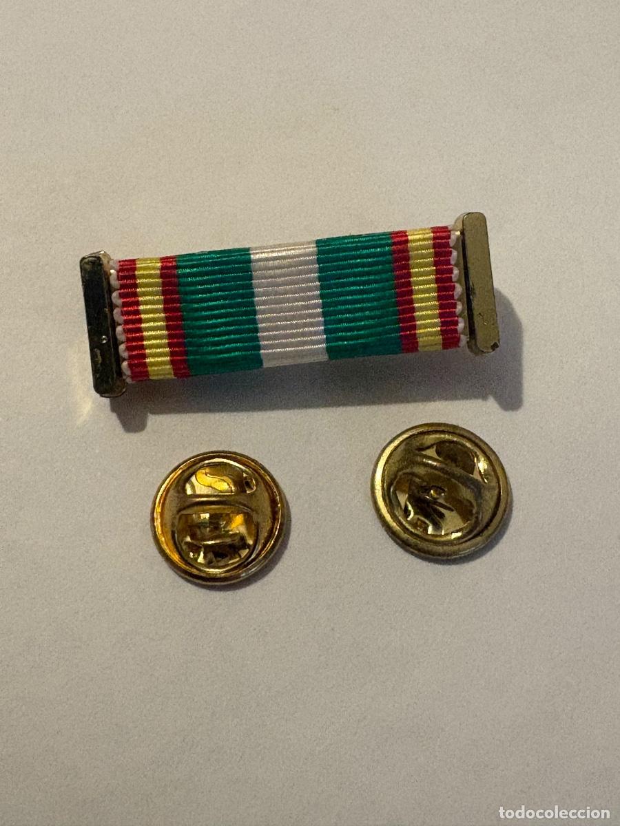 Militaria: ALFILER DE DIARIO DE LA MEDALLA M&Eacute;RITO POLICIAL.