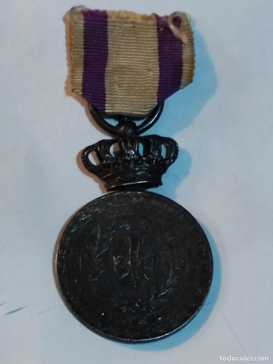Militaria: Medalla carlista a la Caridad