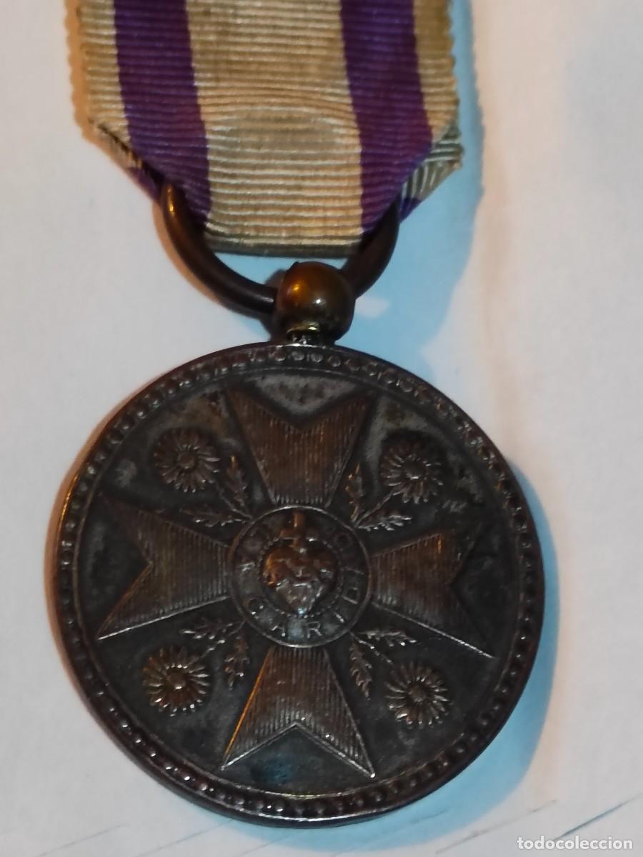 Militaria: Medalla carlista a la Caridad