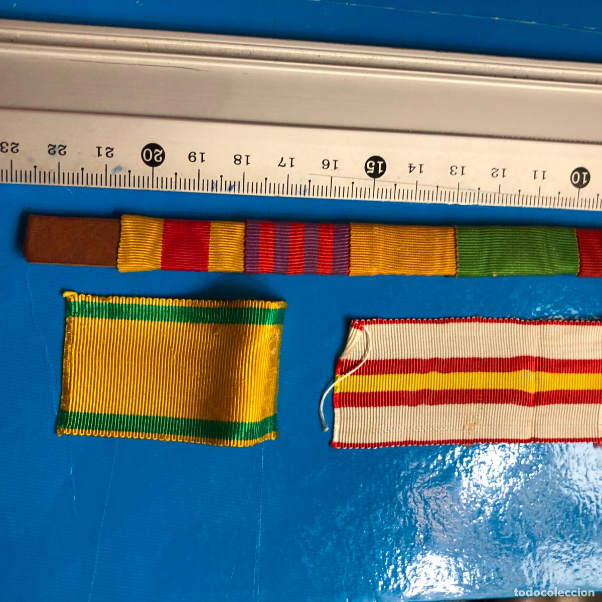 Militaria: PASADOR DIARIO SOBRE CUERO, 6 CONDECORACIONES