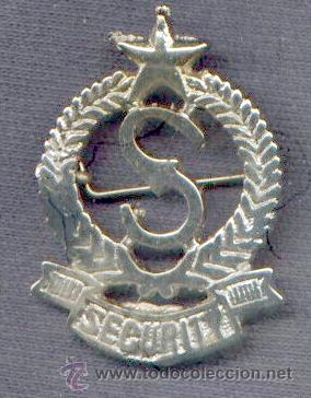 Militaria: India.  Insignia de boina de Seguridad Privada.