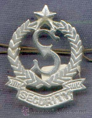 Militaria: India.  Insignia de boina de Seguridad Privada.