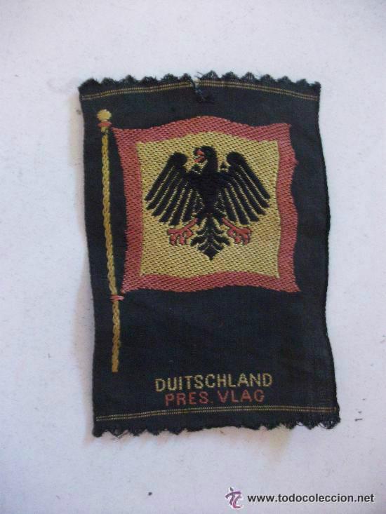 Militaria: PARCHE CON ESCUDO DE ALEMANIA , DEBAJO PONE : DUITSCHLAND PRESS. VLAG . NO SE DE QUE ES .