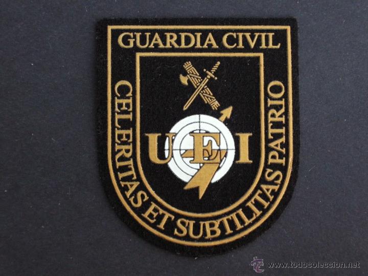 Military Antiques: PARCHE GUARDIA CIVIL U.E.I NUEVO MODELO LLEVA ARRIBA GUARDIA CIVIL,ANTIGUO NO LO LLEVABA.-