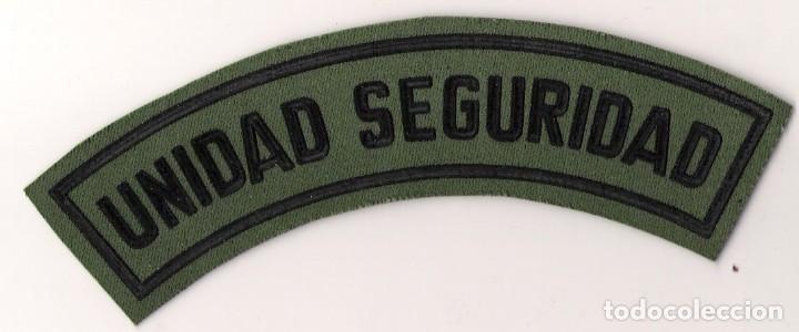 Militaria: PARCHE EMBLEMA TIRA UNIDAD SEGURIDAD VERDE
