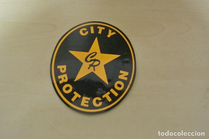 Militaria: PARCHE DE PLASTICO DE EMPRESA DE SEGURIDAD CITY PROTECTION